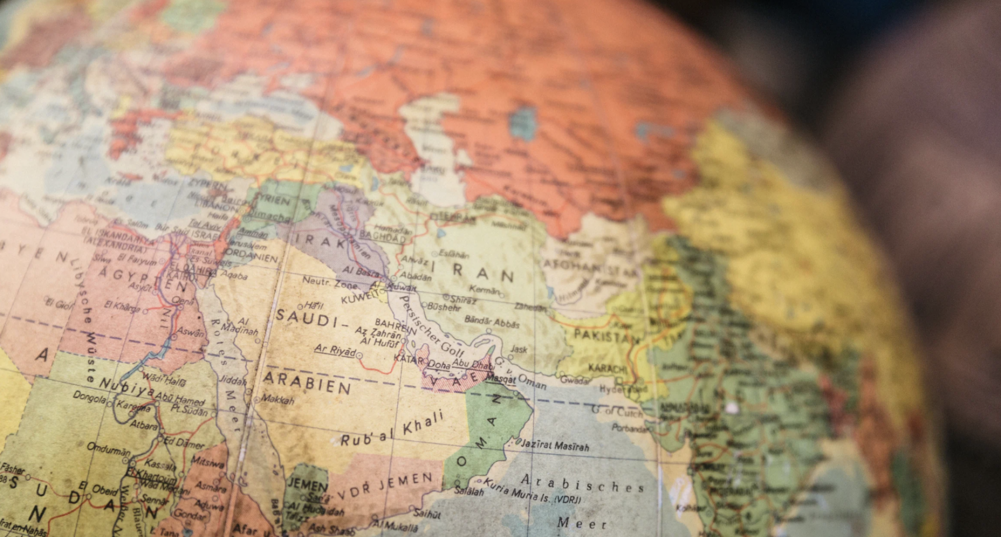 Close-up of a globe showing the Middle East, Central Asia, and parts of North and East Africa